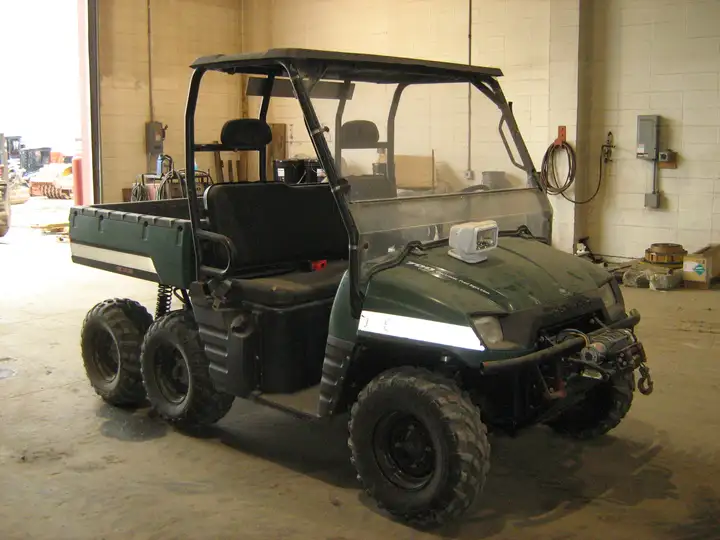 2007 Polaris 6x6 Low Hours With Track Kit.